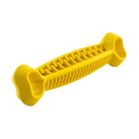 Dental Monster elastyczny gryzak dla psa w kształcie kości 25cm żółty